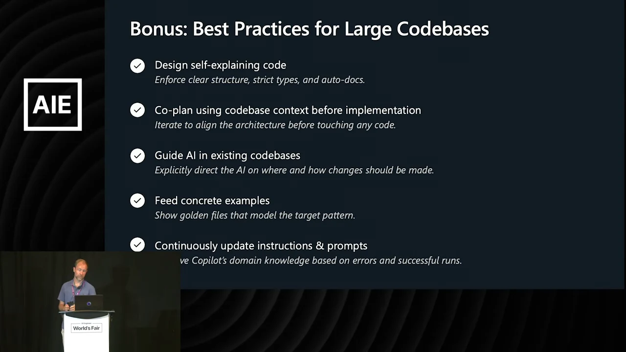 Slide lists self-explaining code, planning with codebase context, guidance for existing codebases, concrete examples, and continuously updated instructions and prompts.
